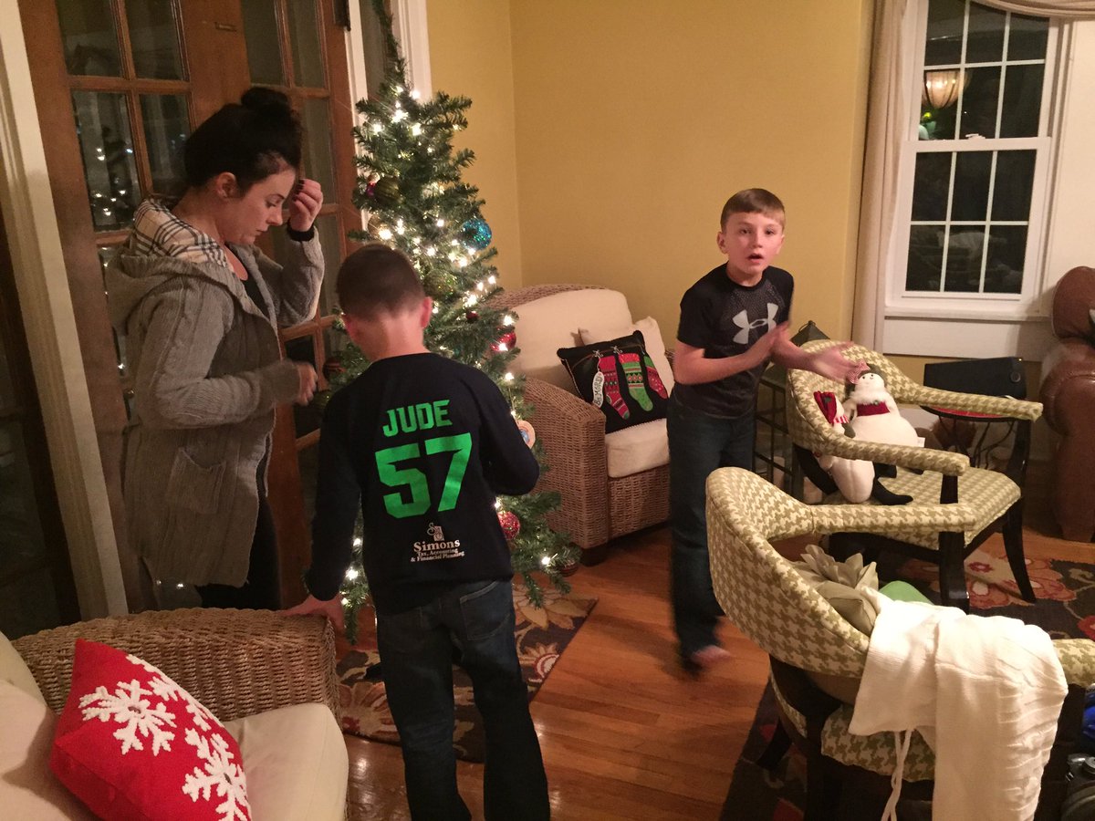 TrooperTodKHP's tweet image. A tree, 2 boys, + a strand of lights that won't work = #Christmas fun. 🎄 Now it's time for some marshmallows. No need to #BuckleUp 2nite! 😊