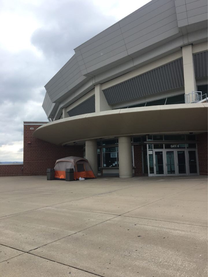 DailyCollegian's tweet photo. First people in line for tickets to the Big Ten Championship have already set a tent up in front of @JordanCenter (@erinoneillphoto | TDC) https://t.co/9VrsOdxRlp