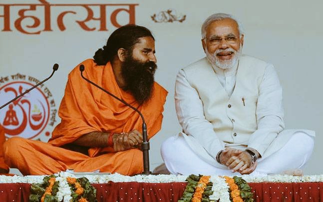 RealHistoryPic's tweet photo. RBI Governor whispering to the Prime Minister that "Our corporate bombing being portrayed as Surgical strike on black money". (2016) https://t.co/INWuU7jooo