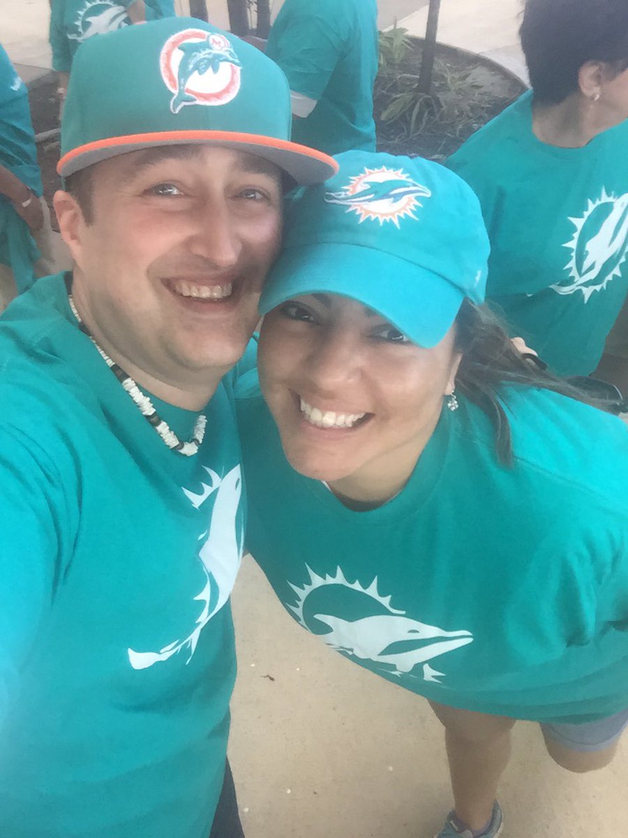 HeathBennett_'s tweet photo. Pregame at #Dolphins Stadium w/ my Iraqi Freedom vet girlfriend. Cool to be on other side of a #FanExperience #FlagHolders @FlaPanthers #USA https://t.co/lLu6Dl7qjM