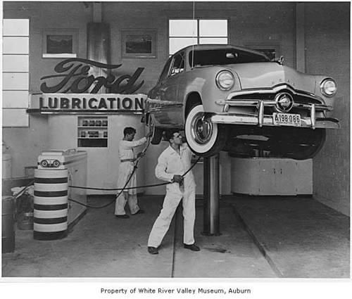 bieberiso74's tweet photo. Vintage service station with 1949 Ford on the lift.      
#vintage #retro #blackandwhitephotography https://t.co/aNjYSev4vi