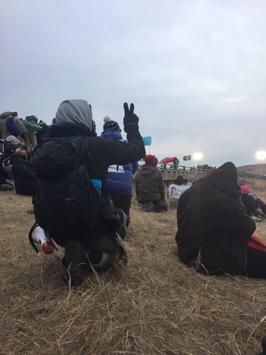 Silent prayer happening now on Backwater Bridge. #NoDAPL