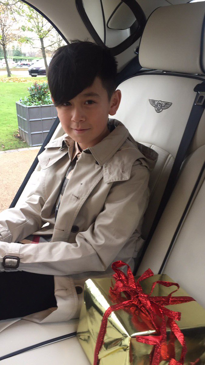 Owa boy livin it large on his fust day modelling, 11 year old walking rund better dressed than me