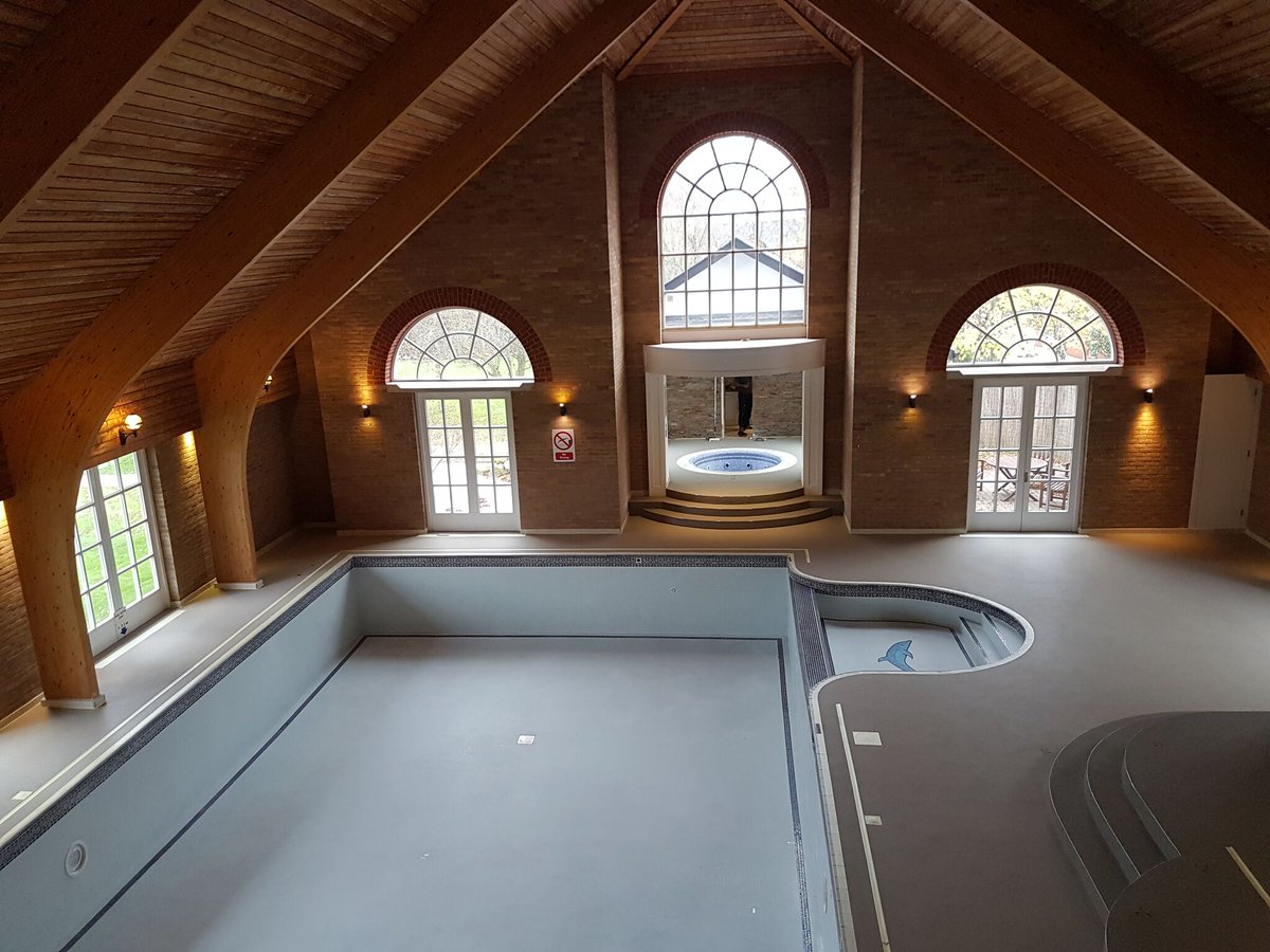 Flexflooring's tweet photo. 190m2 of epoxy quartz screed to hotel swimming pool, with 630mm upstands and enhanced non slip. #quartzscreed #resinfloors #poolsurround https://t.co/tUjfcEhjQV
