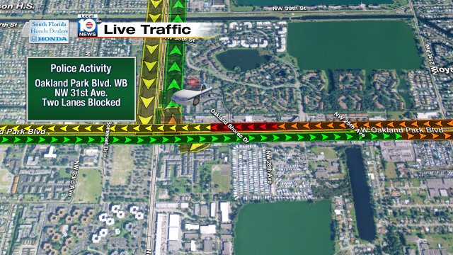 POLICE ACTIVITY: Oakland Park Blvd WB right before your approach to NW 31st Ave. Two lanes are blocked. #TRAFFIC https://t.co/o8PMFDKbNn