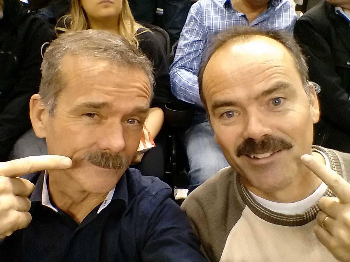 Cmdr_Hadfield's tweet photo. Moustaches @Raptors game. Brother Phil grew his for @Movember. Hard for 2 men to look any better! #baskets4bros https://t.co/fvkppNLUwp