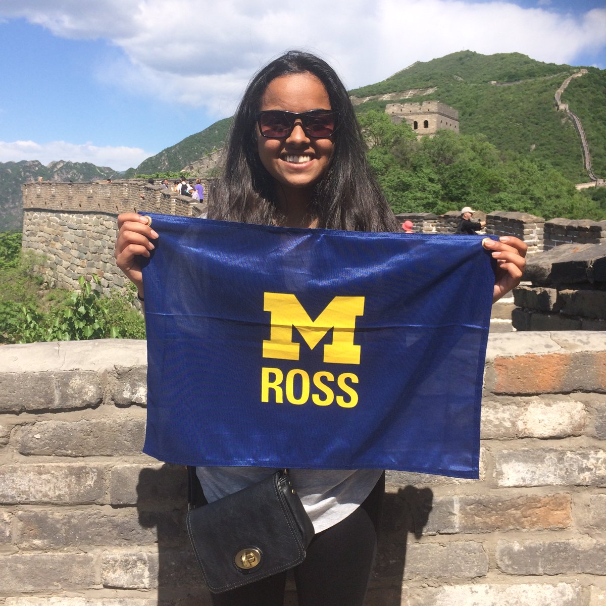 umcsg's tweet photo. Arathi Sabada, Chief Operating Officer, is sporting the M logo at the Great Wall of China! #GivingBlueday 
https://t.co/FF8KXoQNUj https://t.co/umIJnifleo