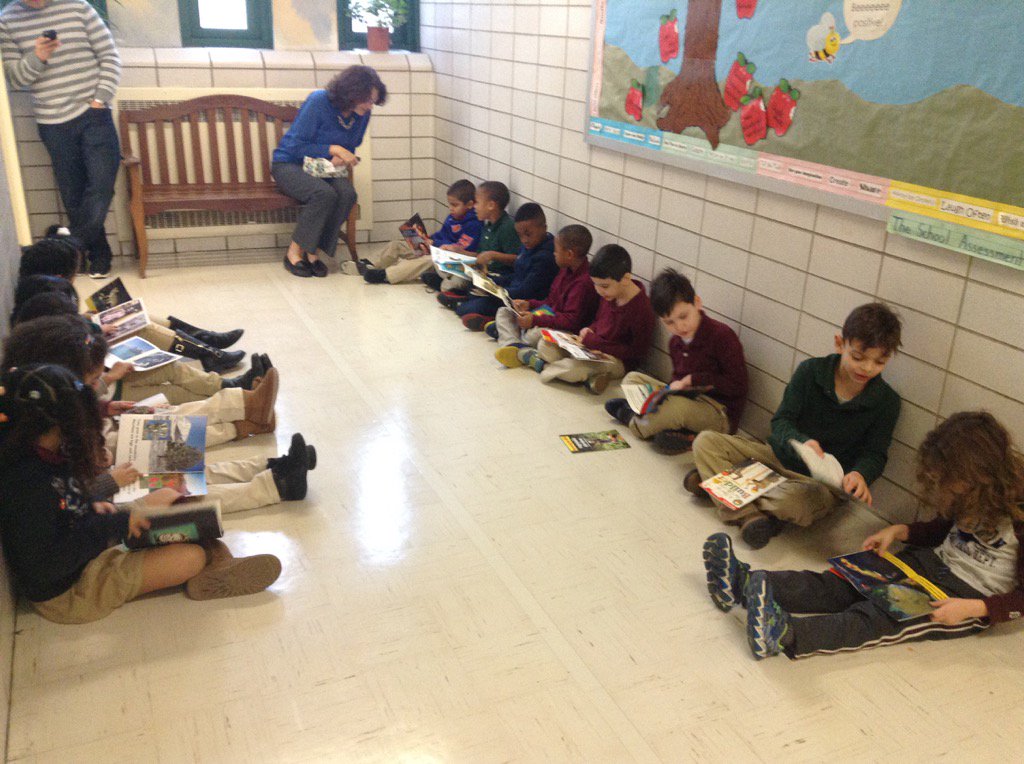 208 reading while they wait for their vision screening!