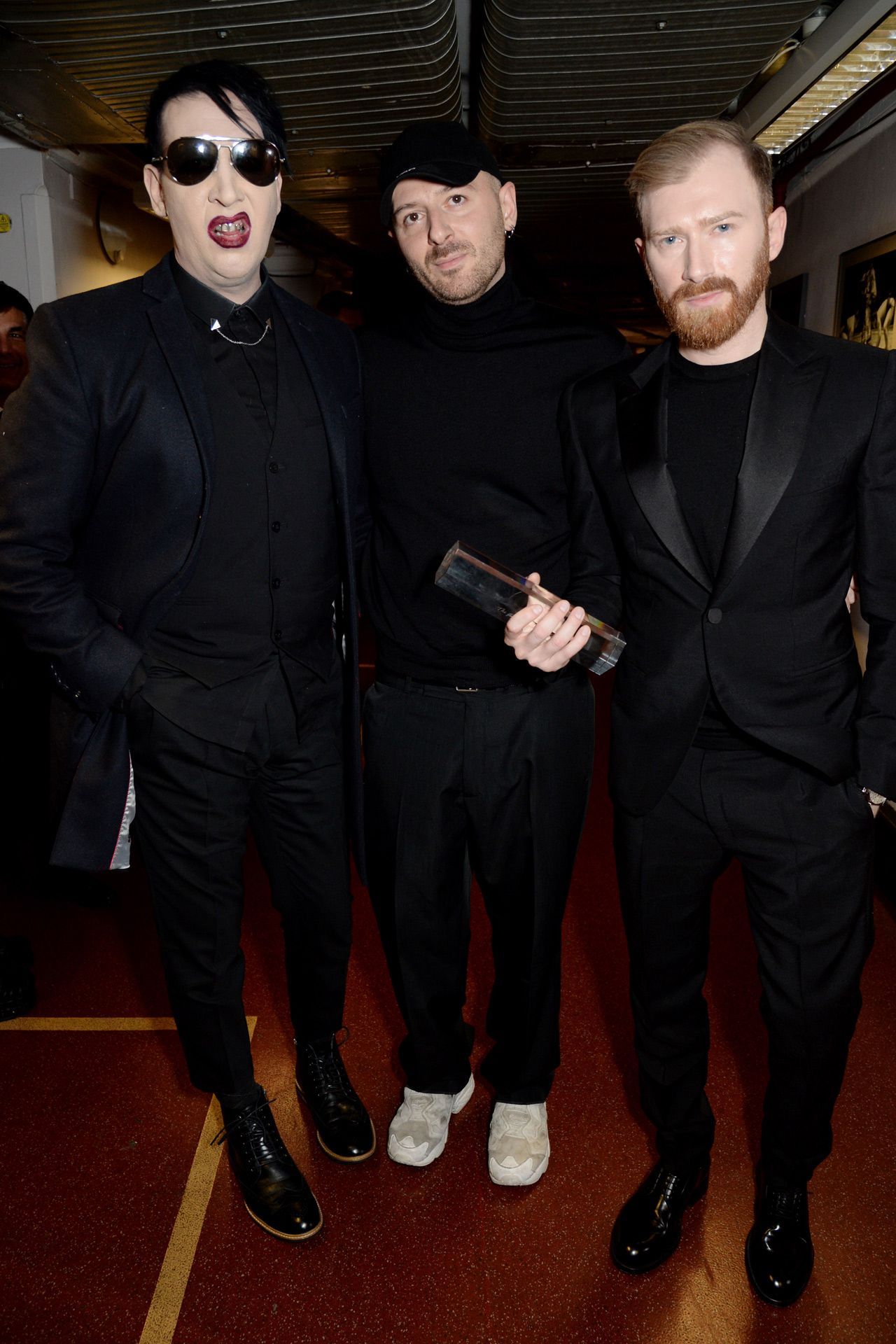 Marilyn Manson  Manson Source on X: Marilyn Manson, Demna Gvasalia and Guram  Gvasalia (Vetements) pose backstage at The Fashion Awards, London,  05.12.2016. @marilynmanson  / X