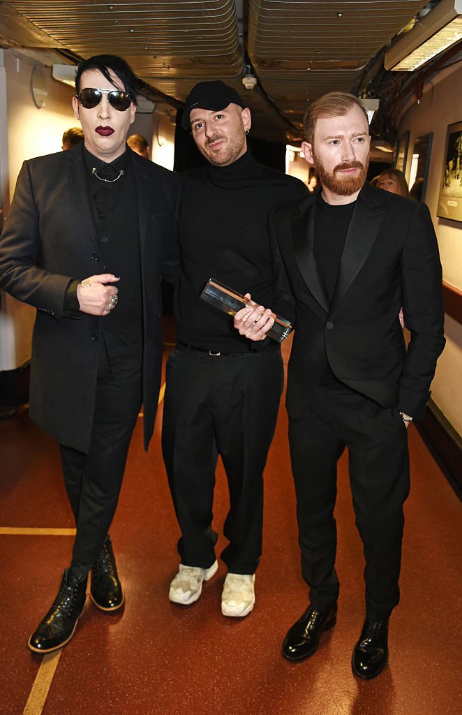 Marilyn Manson  Manson Source on X: Marilyn Manson, Demna Gvasalia and Guram  Gvasalia (Vetements) pose backstage at The Fashion Awards, London,  05.12.2016. @marilynmanson  / X