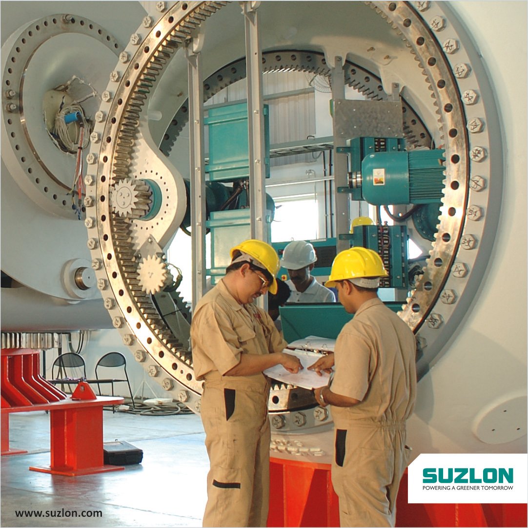 Suzlon's tweet image. A workforce of over 4,000 people with a vision of a greener tomorrow contributes in manufacturing our world class wind turbines.