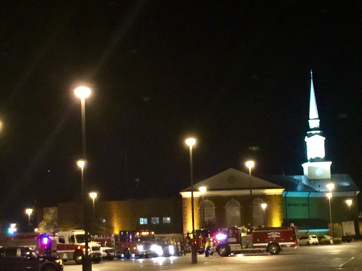 Tina_Tark's tweet photo. Heroes,staging in the shadow of our Steeple.  It's after 2 am and they're nowhere near done.  #prayforGatlinburg #fbcsev #gatlinburg https://t.co/eEtpFnAauk