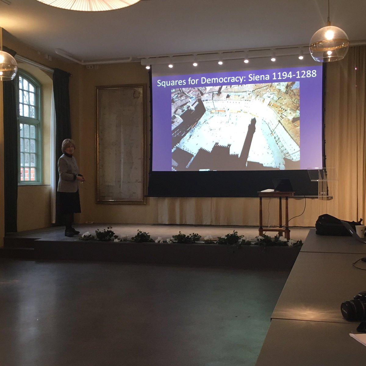 dkbrain's tweet photo. Suzanne Crowhurst Lennard, discussing the civic life of squares. https://t.co/yebb8WuuEb