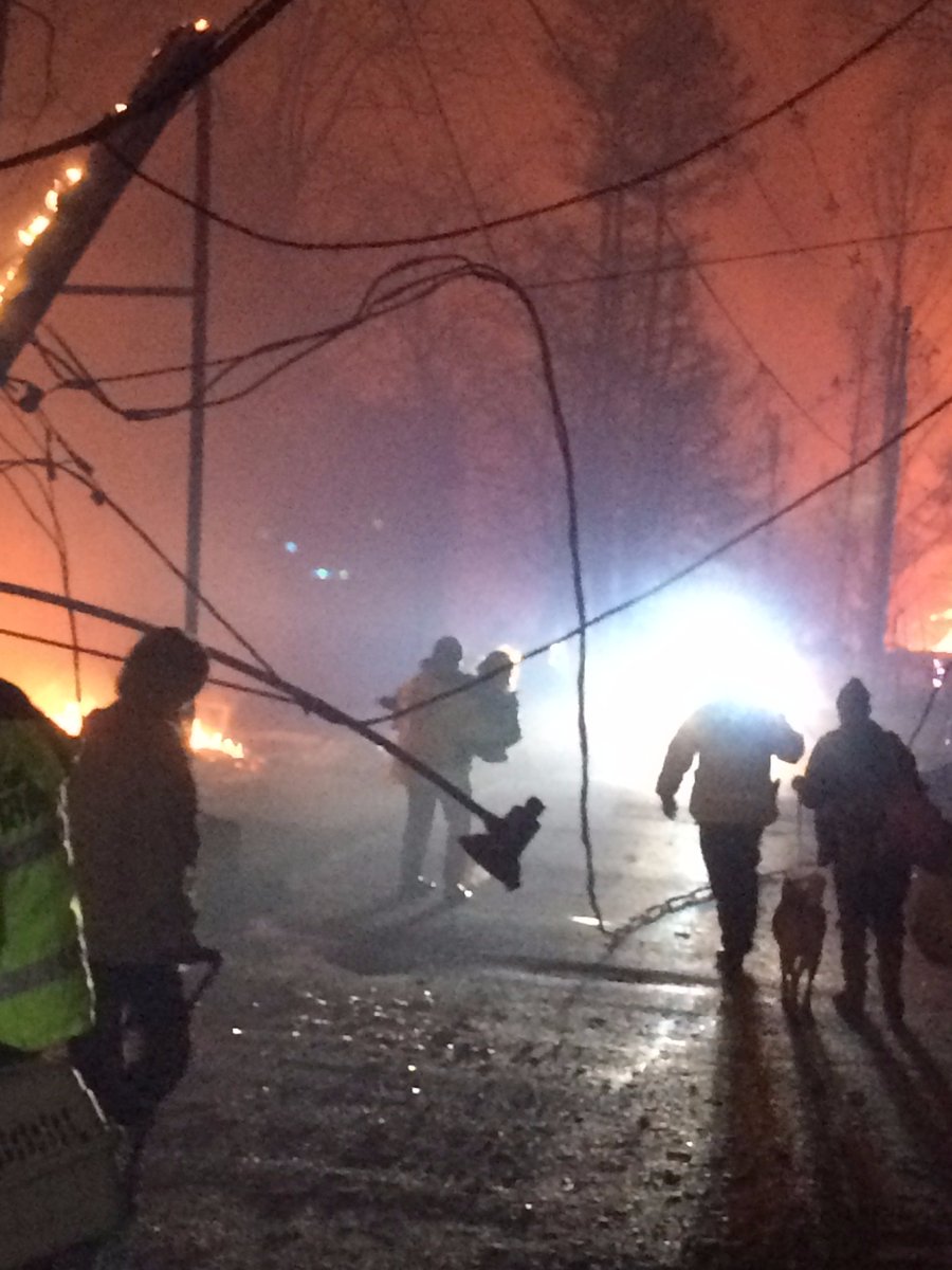 TNHighwayPatrol's tweet photo. Troopers walked into areas of Gatlinburg, Tn that were surrounded by fire to remove those who were trapped by flames. https://t.co/9r2lkAVy19
