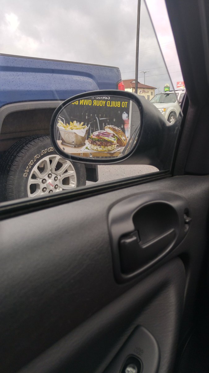 ston3d2d3ath's tweet photo. Just waiting for my husband while staring at a poster for a burger in my mirror. #hungry https://t.co/JGQoHIKNCU