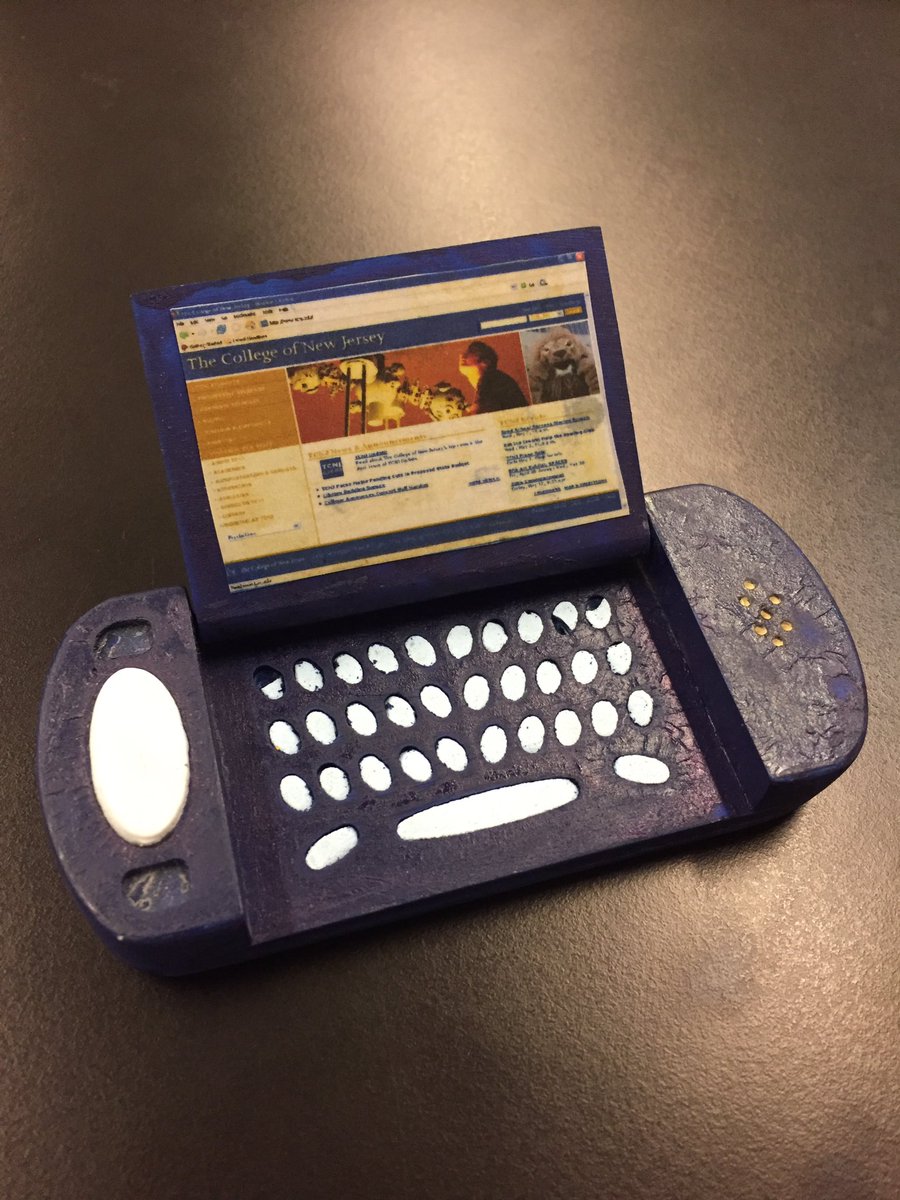 MrD_Leonard's tweet photo. Found an old college project circa 2004. Wooden mockup and CNC-ed prototype. Very innovative design back then. #preiPhone #flipphone https://t.co/cBeeK3UXWL