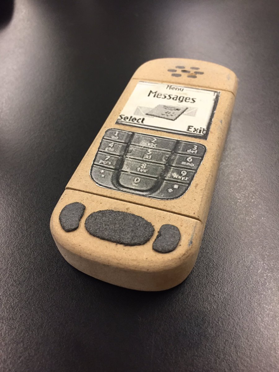 MrD_Leonard's tweet photo. Found an old college project circa 2004. Wooden mockup and CNC-ed prototype. Very innovative design back then. #preiPhone #flipphone https://t.co/cBeeK3UXWL