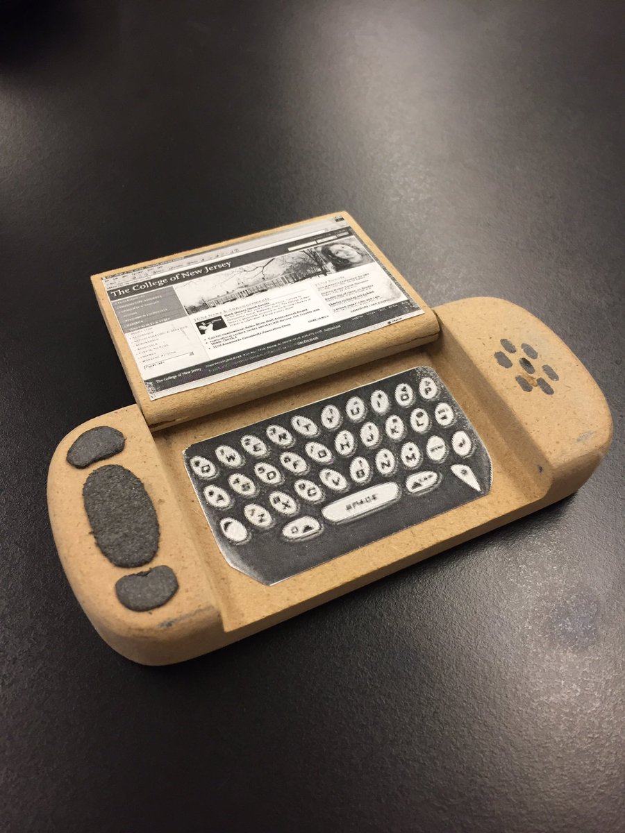 MrD_Leonard's tweet photo. Found an old college project circa 2004. Wooden mockup and CNC-ed prototype. Very innovative design back then. #preiPhone #flipphone https://t.co/cBeeK3UXWL