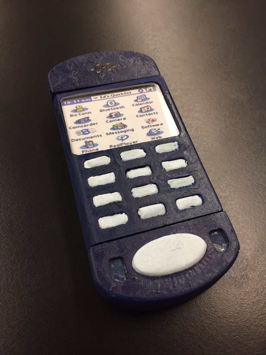 MrD_Leonard's tweet photo. Found an old college project circa 2004. Wooden mockup and CNC-ed prototype. Very innovative design back then. #preiPhone #flipphone https://t.co/cBeeK3UXWL