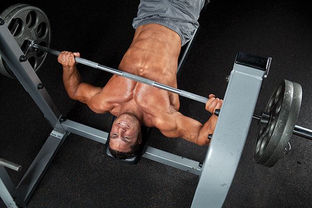 LA Tip: Decline bench press is a highly underrated exercise that targets the lower pectorals and should be included in your chest workout.