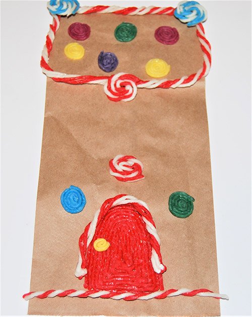 Wikkistix's tweet photo. Gingerbread House Brown Bag #CraftsforKids https://t.co/YvE3MwokCf #gingerbreadcrafts #holidaycrafts #wikkistix #paperbagcrafts https://t.co/CZ8Yii86EX