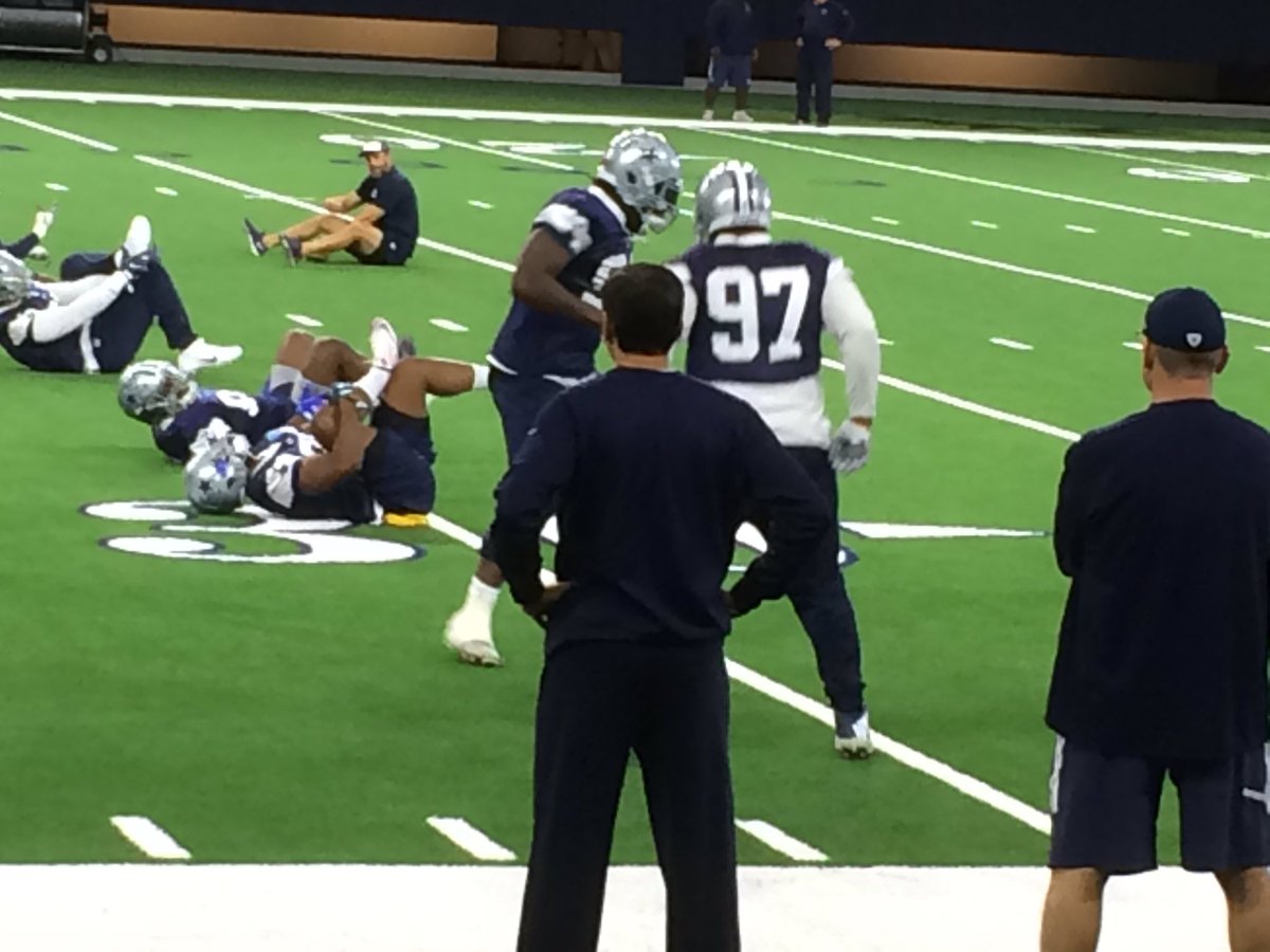 PatDoneyNBC5's tweet photo. .dallascowboys DL DeMarcus Lawrence & Terrell McClain just had a dance off during stretching. A ton of energy at The Star this morning. https://t.co/LjwXjhbPKI