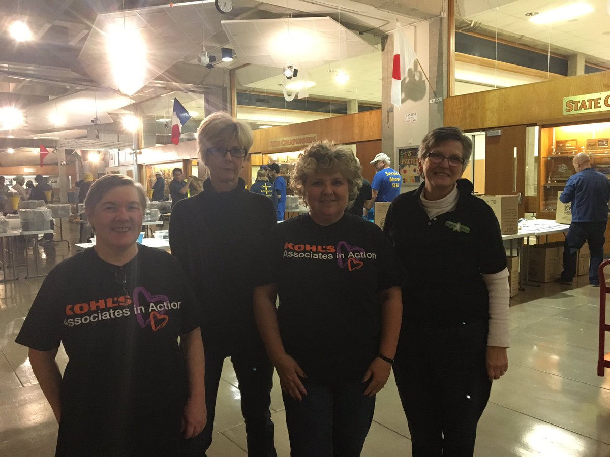 Volunteer from Kohls cash for kids helping out Interact Club at Stop Hunger Now Event <a href="/smnw_office/">SMNW Office</a> <a href="/theSMSD/">SM School District</a>
