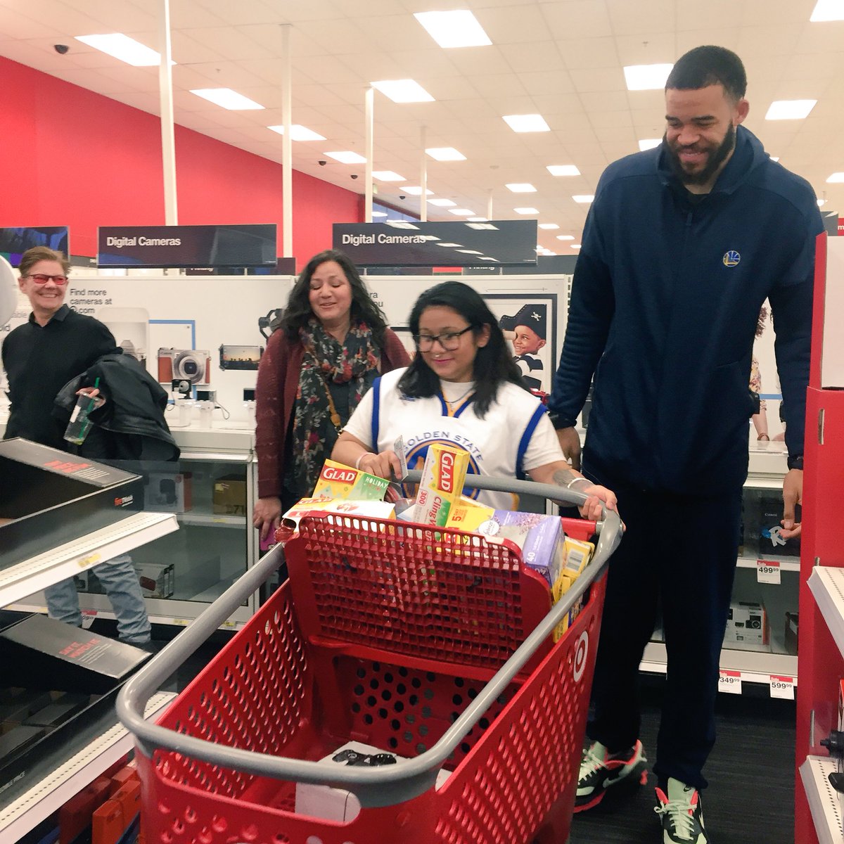 warriors's tweet photo. .@JaValeMcGee34 surprised five #GladToGive Heroes with a @Target shopping spree as part of the #SeasonOfGiving 🎁 https://t.co/RYfqkUBu33
