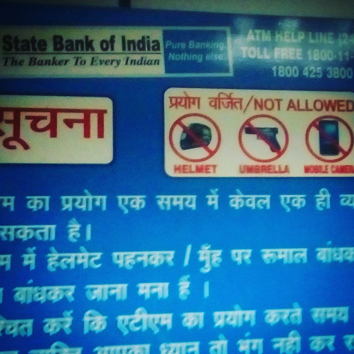 chowyungphat's tweet photo. No gun shaped "umbrellas" in #StateBankOfIndia #ATMs #lostintranslation https://t.co/WcEAgVA4NX