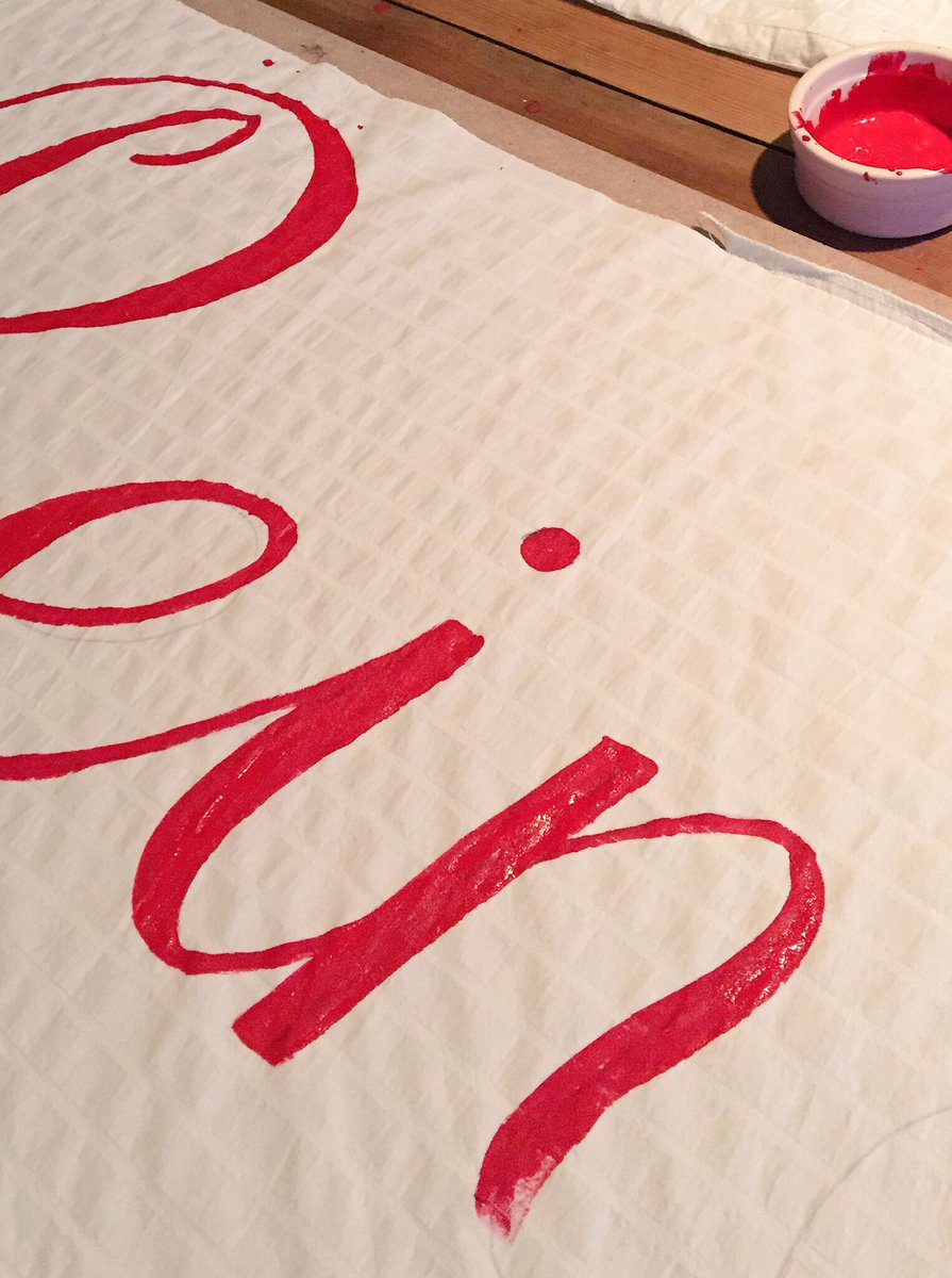 SableWinbourne's tweet photo. Painting 13 Xmas Banners as large as a bus 🚌....7 more to go! #redfingers 🐾 https://t.co/ZYVzXcQnRD