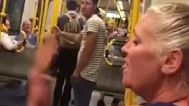 theantibogan's tweet photo. Asian woman racially vilified on Gold Coast tram and told “speak (expletive) English”… https://t.co/fn5NX7YplW https://t.co/9DCsemn8wD