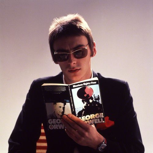BoredWeb3's tweet image. Paul Weller reading &quot;1984&quot;