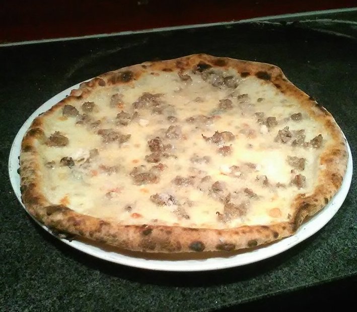 This weekly special is exclusively available in the restaurant - mozzarella, blue cheese, Italian sausage and Parmesan.