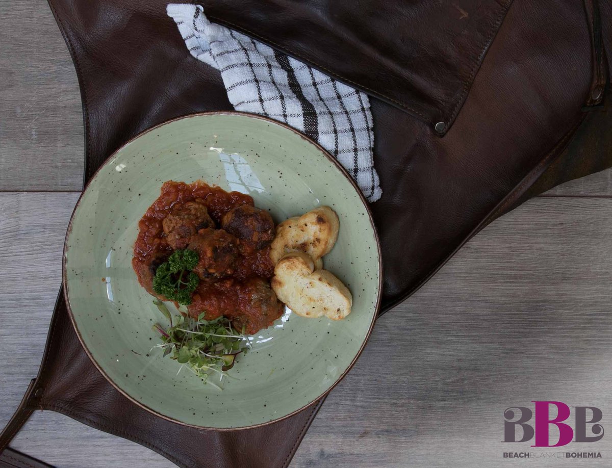 Try our Albonigas dish, delicious spanish style meatballs drowned in a spicy onion, tomato and red wine sauce. #BeachBlanketBohemia