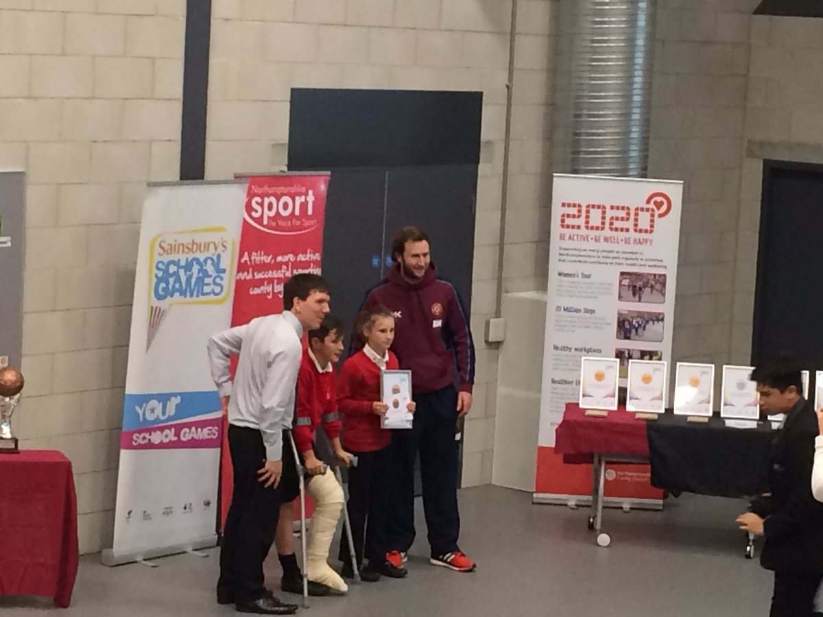 COTSchoolSport's tweet photo. #weldonschool collect their @YourSchoolGames bronze award from @NorthantsCCC @AlexWakely1 https://t.co/BpTzP97BMQ