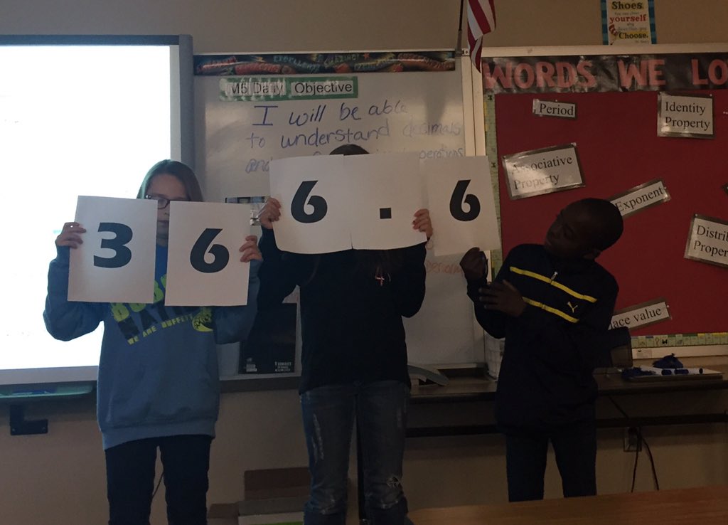 WebushisHistory's tweet photo. Modeling decimal place value by acting it out! @BuffettMagnet @Team_Guardiola #buffettknowsmath https://t.co/gZQJgM2bba