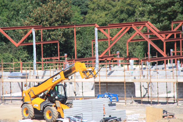 JaneDBurnside's tweet photo. Hillsborough House shaping up well with mini steel frame being encased in highly insulated blockwork. https://t.co/953RAzoZY4