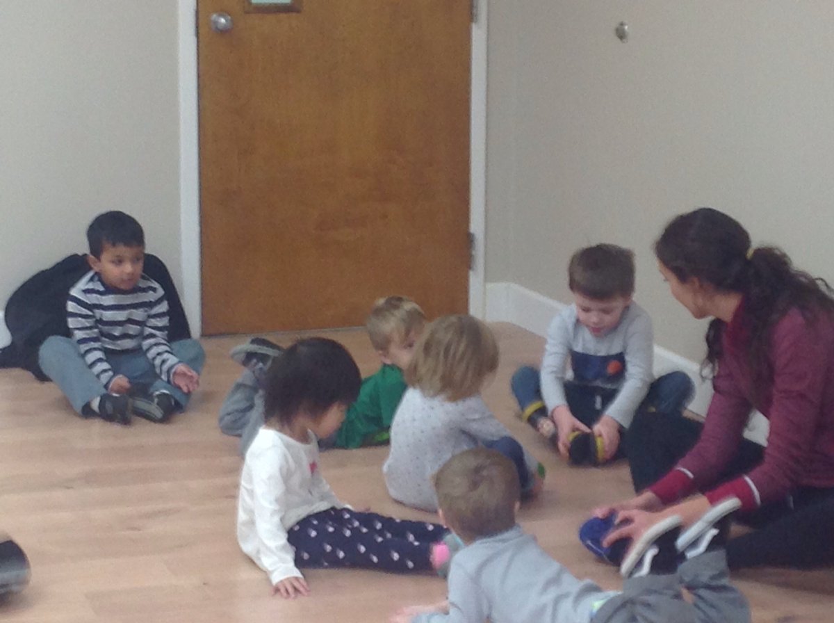 Miss Chrissy loves planning new yoga lessons for all of our students including the infants.