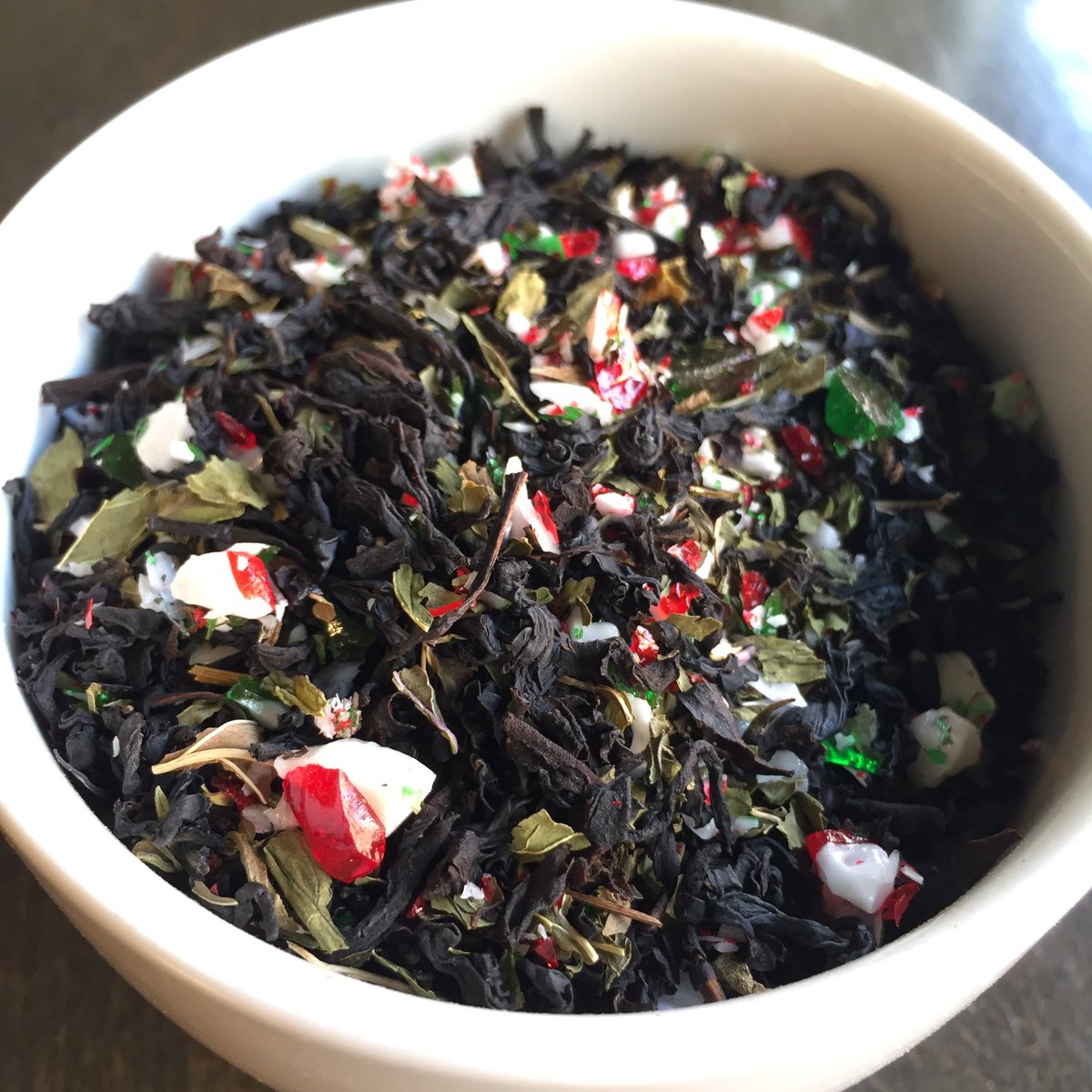 WorldTeaHouse's tweet image. The only time of year we put candy in our tea, CANDY CANE: black tea, vanilla, mint, candy cane bits #HandBlended #HolidayTea