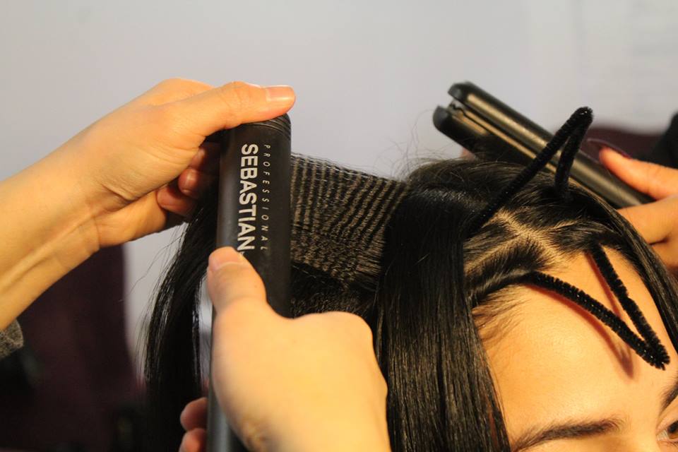 SalonEM_boston's tweet image. #TBT Sr. Designer @snowkee’s working on her @SebastianWNA entry using pipe cleaners to construct her look. Stay tuned for the final style!