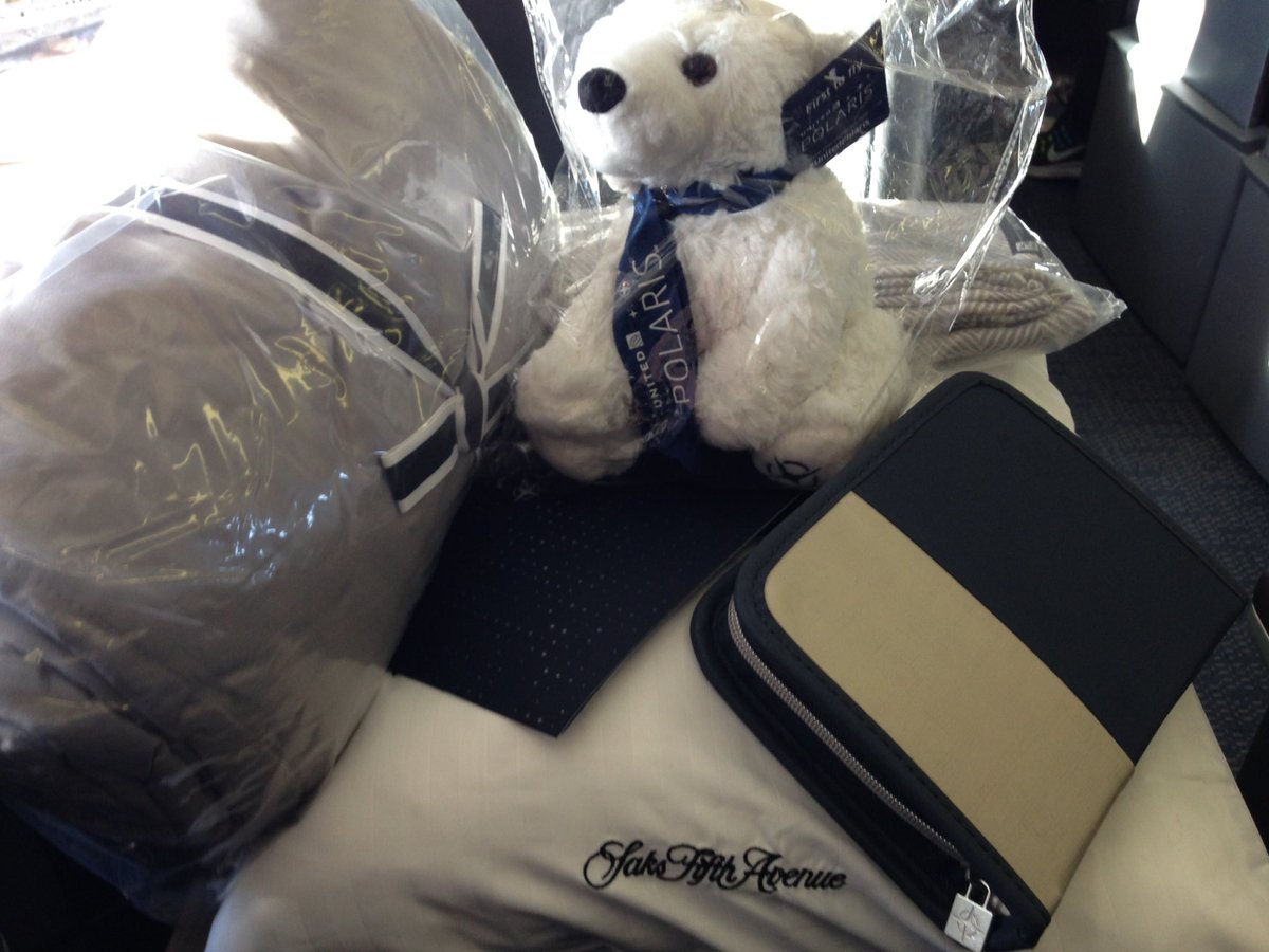 First to fly #UnitedPolaris with <a href="/saks/">Saks Fifth Avenue</a> bedding, teddy bear, handcrafted <a href="/TitosVodka/">TitosVodka</a> Bloody Mary &amp; glass of <a href="/JosephPerrierUK/">Joseph Perrier UK</a> <a href="/united/">United Airlines</a> CDG>ORD.