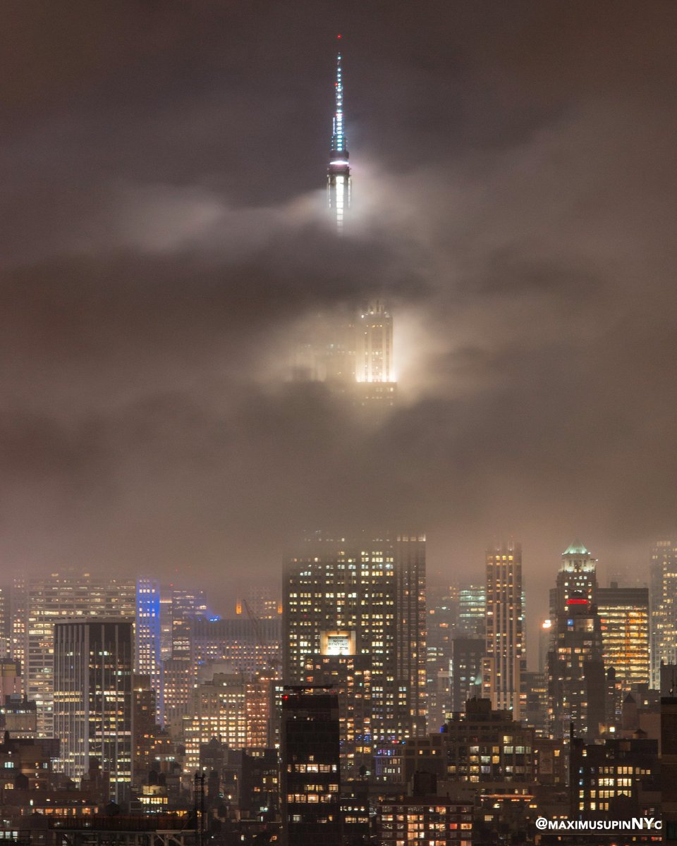 GMA's tweet photo. Incredible shot of @EmpireStateBldg cloaked in fog. 📷: @maximusupinNYc https://t.co/L2elp8GFdk