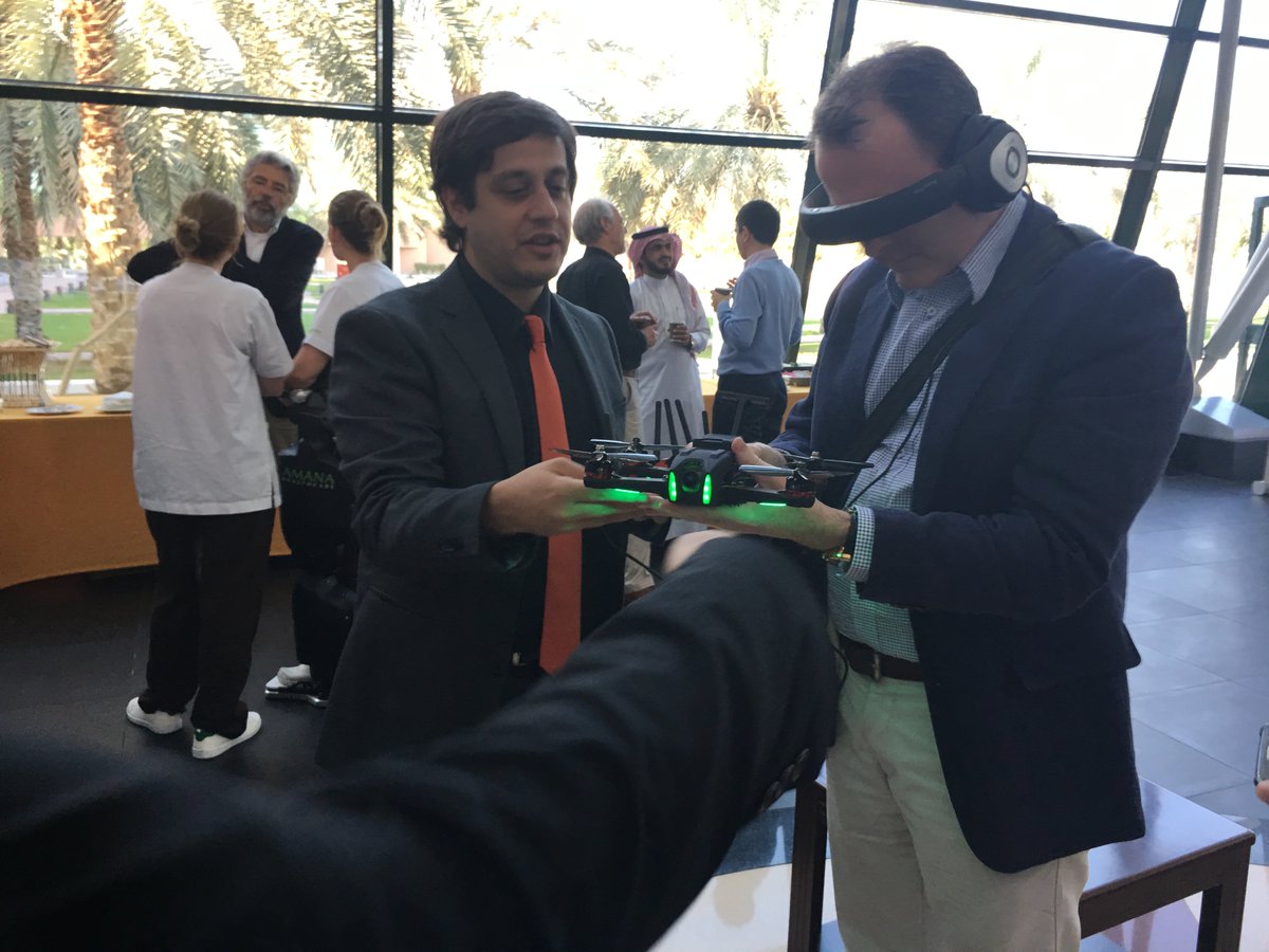 UVify's tweet image. CEO of #PALRobotics-maker of the cool #REEM #robots enjoying #UVify #Draco racing #drone #UAEU #NYUAD #SocialRobotics Symposium in  #UAE.