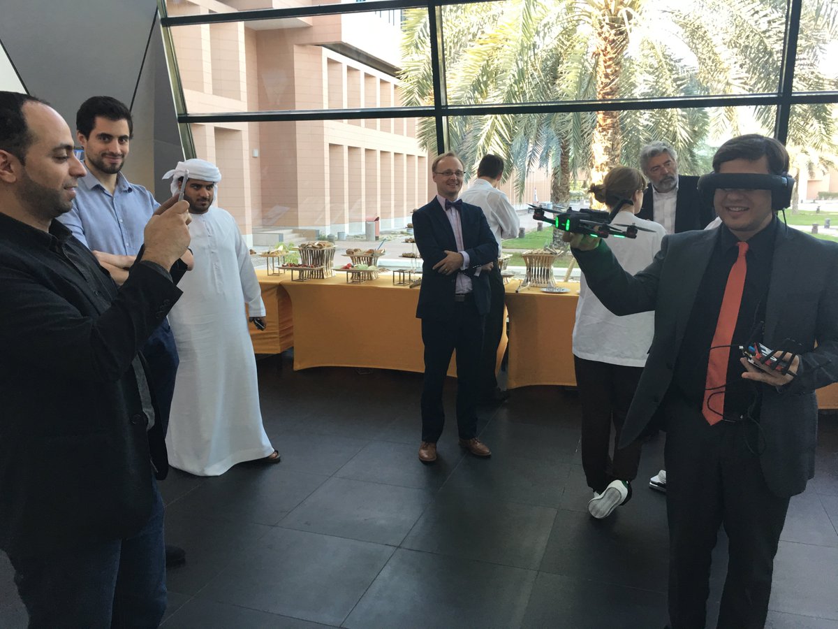 UVify's tweet image. CEO of #PALRobotics-maker of the cool #REEM #robots enjoying #UVify #Draco racing #drone #UAEU #NYUAD #SocialRobotics Symposium in  #UAE.