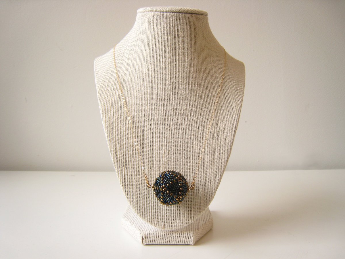 SunDropsStudio's tweet photo. C'est Finit! #New Custom #Icosahedron Necklace. I love making custom orders. I want more! #handmade #mathart #beadstitching #seedbeadart https://t.co/B5KHaztwV7