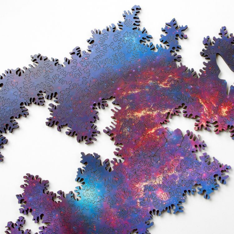 R1Creative's tweet image. Artistic, playful #design uses math &amp;amp; lasers to create a galaxy jigsaw puzzle that can be arranged in infinite ways  bit.ly/2gzTqhe
