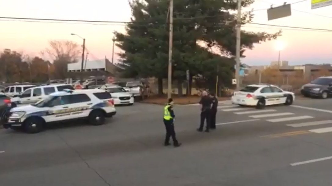 smillsaps423's tweet photo. HCSO & @ChattanoogaPD assisting w/ dismissal at @MyCSAS after lockdown. Search for suspect who shot officer continues. https://t.co/DQNNkcCvs6