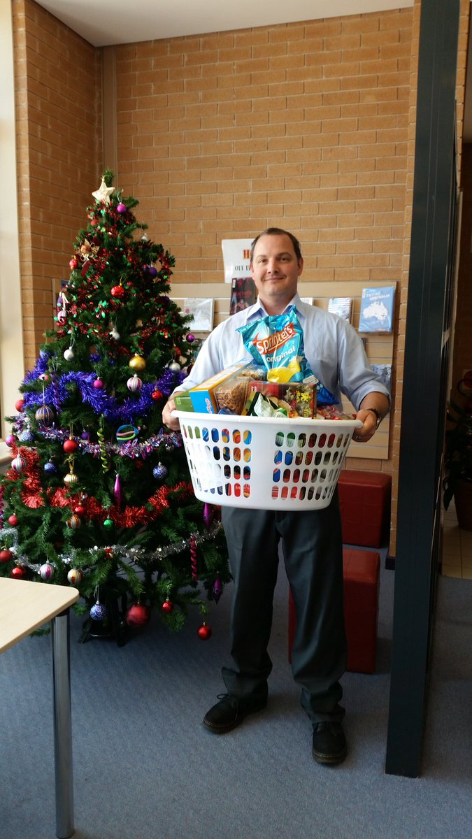 sdharradine's tweet photo. Mr Stevens delivering the library's  Hamper for the Christmas appeal https://t.co/R3AmykpH8x