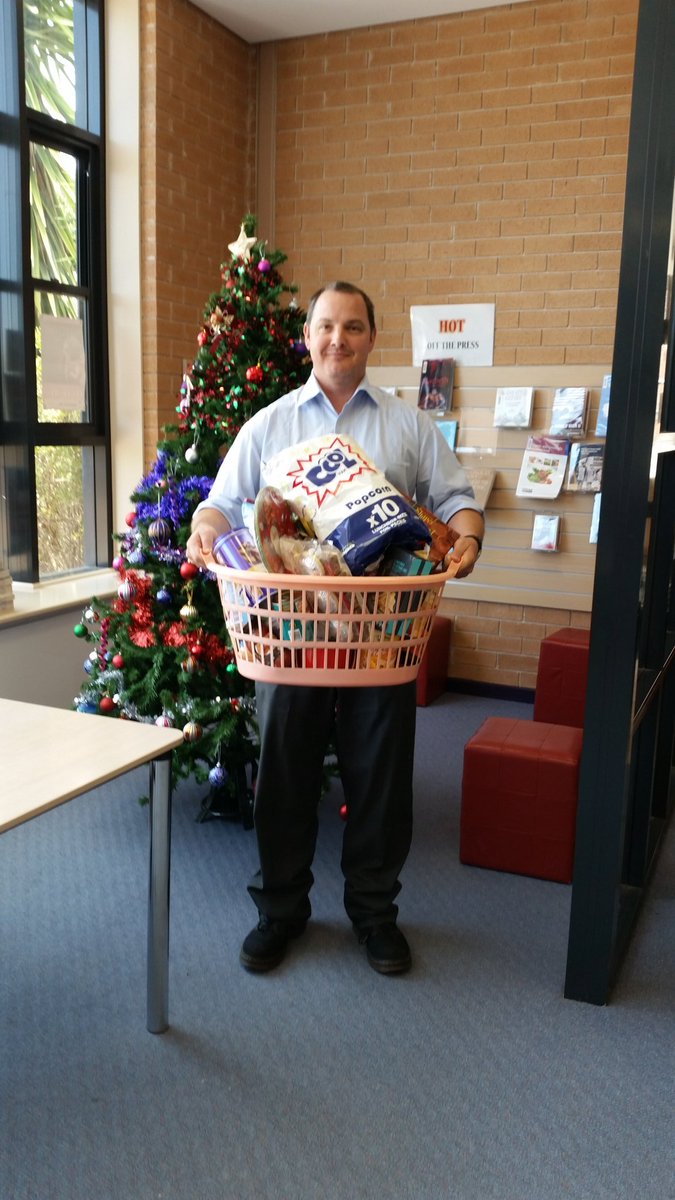 sdharradine's tweet photo. Hamper number 2 from the @SPC_StPats library  for the Christmas appeal. Thanks Mr Stevens for your help #SPCstpats https://t.co/61GOAM3b1z