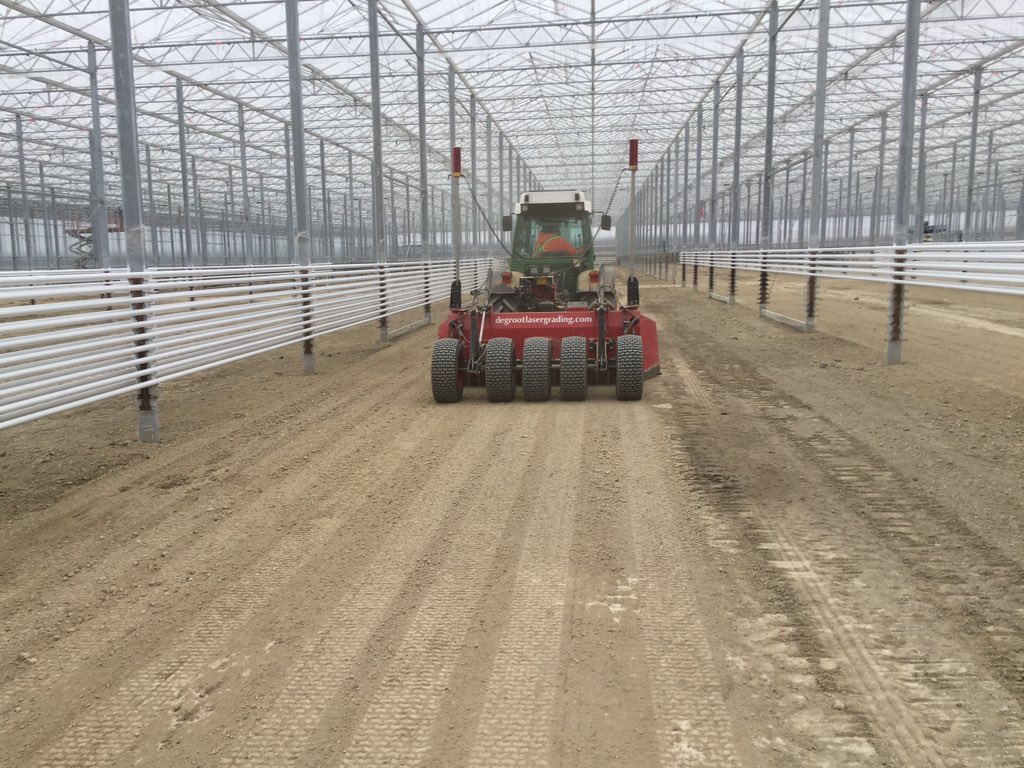 Doing the final levelling in the greenhouse